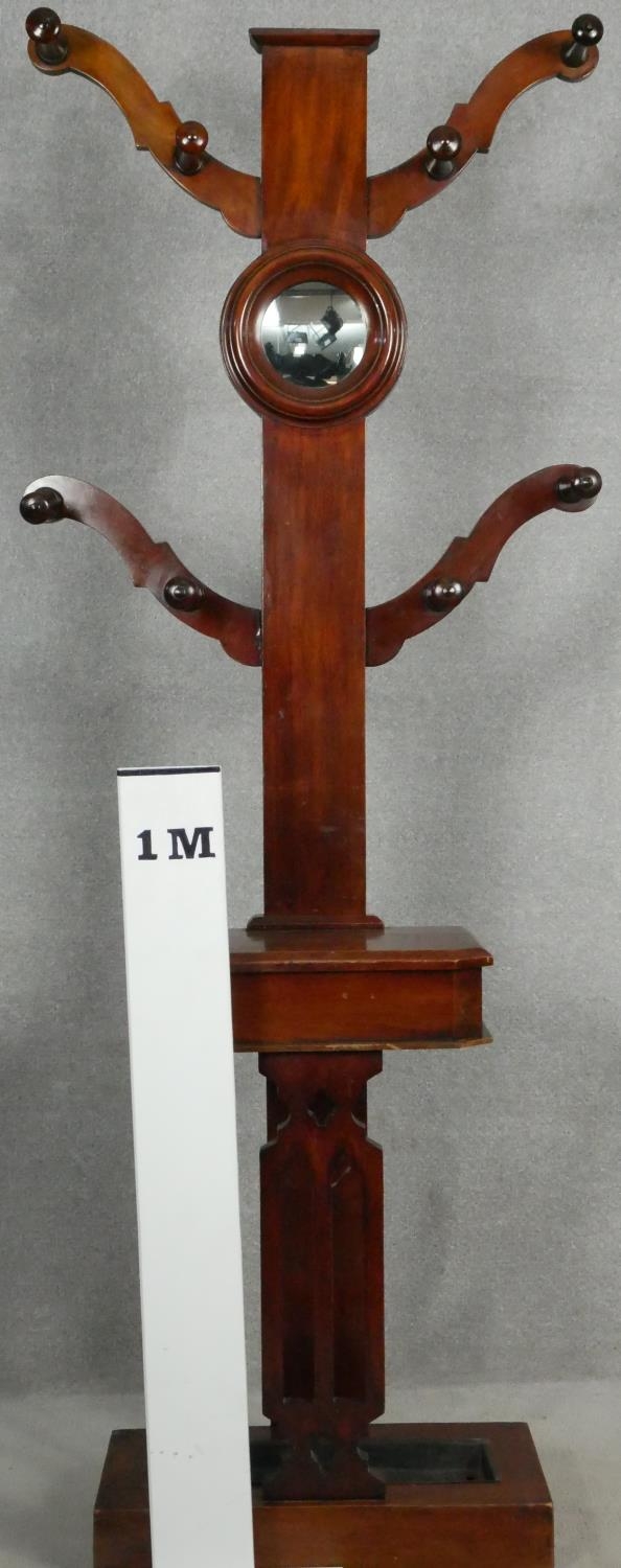 A Victorian mahogany hallstand with turned coat hooks on swept branches fitted with vanity mirror - Image 4 of 4