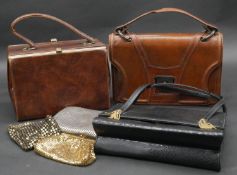 A collection of vintage evening handbags. Including three mesh coin purses, a leather effect box