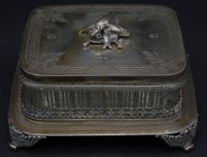 An antique silver plated engraved sardine dish with pressed glass liner. The lid is engraved with