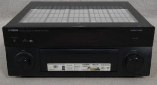 A Yamaha RX-A1040 AV receiver. H.18 L.43.5 W.38cm (NB - has no power cable).