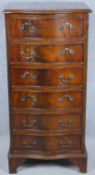 A Georgian style mahogany serpentine fronted chest of six drawers on bracket feet. H.99 W.49 D.40cm