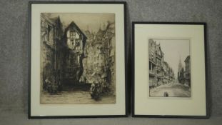 Two framed and glazed signed etchings of town scenes. Both indistinctly signed, one titled Watergate