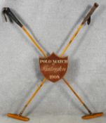 A vintage crossed Polo mallets match trophy from Hurlington, 1908. With wooden painted shield with