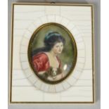 A 19th century ivory mosaic and mother of pearl framed miniature on ivory, depicting a young lady in