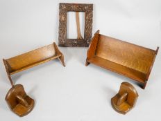 Two vintage oak book troughs, a similar pair of bookends and a carved frame. H.35 W.28