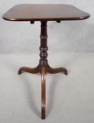A 19th mahogany tilt top occasional table on tripod swept supports. H.70 W.54 D.50cm