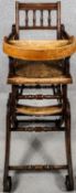 A late 19th century walnut framed metamorphic high chair converting to child's rocking chair with