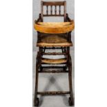 A late 19th century walnut framed metamorphic high chair converting to child's rocking chair with