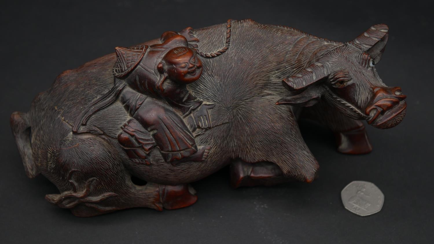 A Chinese carved rosewood water buffalo with man on his back on floral design pierced hardwood - Image 6 of 8