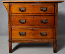 A late Victorian walnut chest of drawers on block supports. H.82 W. 92 D.47