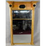 A Regency giltwood full height pier mirror with ball decorated architectural cornice above