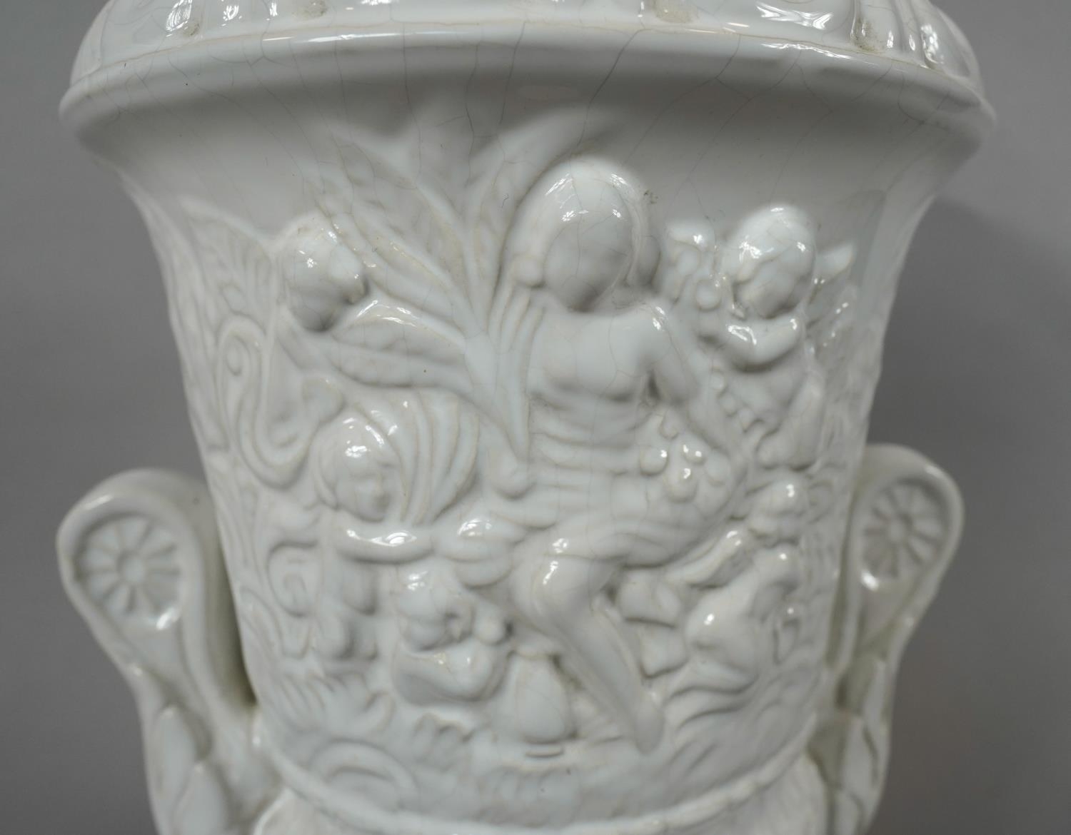 A Pereiras ceramic Portuguese white glazed Classical design two handled lidded urn. Makers stamp - Image 3 of 6