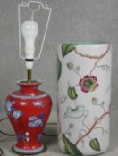 A floral glazed umbrella stand along with a Chinese style table lamp on gilt metal base. H.61cm