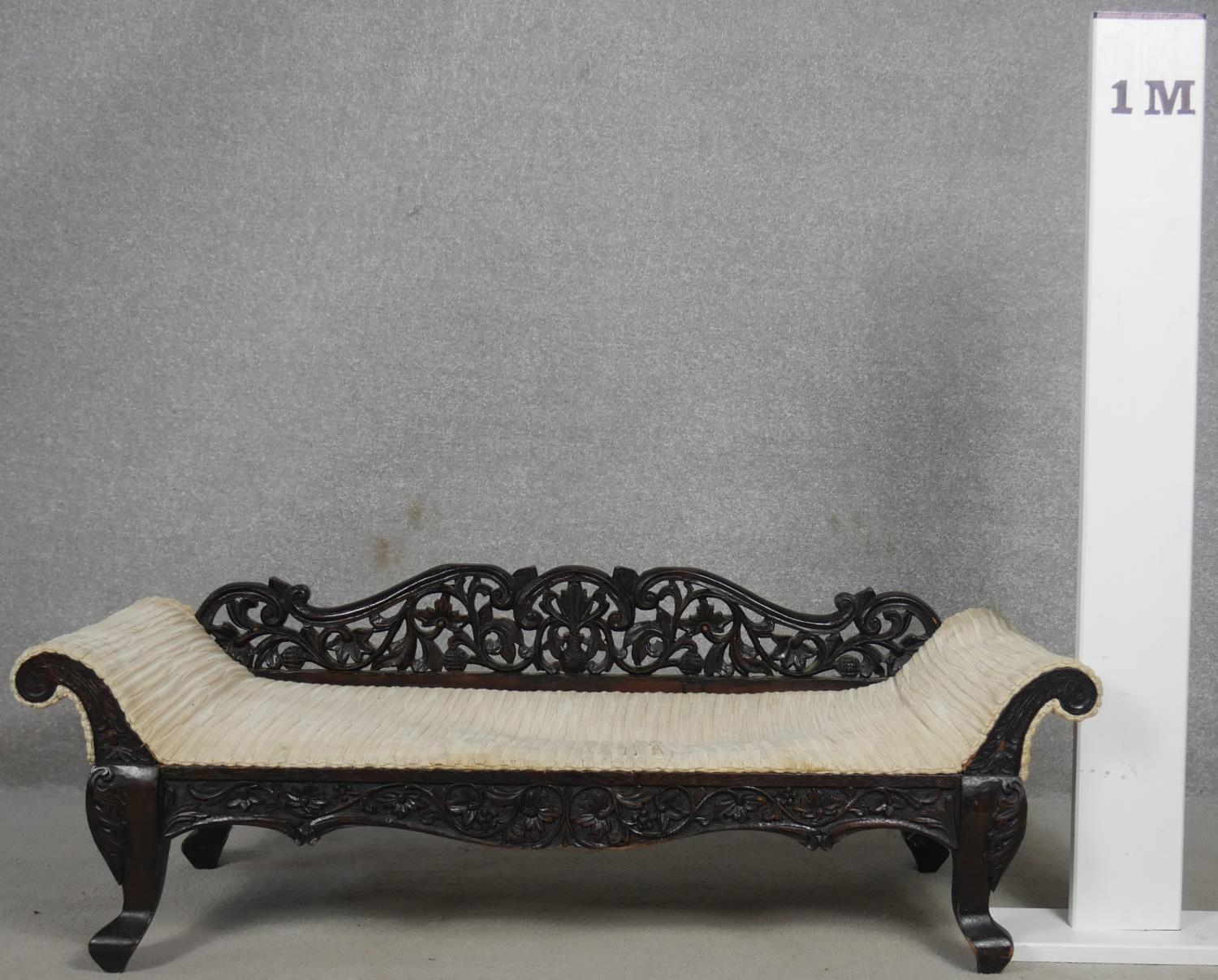 A miniature Burmese hardwood double end chaise longue with all over carved and pierced decoration. - Image 4 of 4