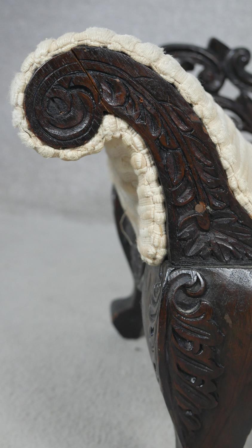 A miniature Burmese hardwood double end chaise longue with all over carved and pierced decoration. - Image 3 of 4