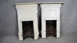 A pair of late 19th century cast iron fire places and surrounds. H.100 W.56