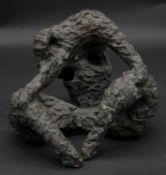 A bronze effect resin of abstract figural form. H.16cm