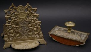 A Victorian scrolling design pierced brass letter rack with shell form pen tray and an Art Nouveau