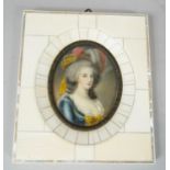 A 19th century ivory mosaic and mother of pearl framed miniature on ivory, depicting a young lady in