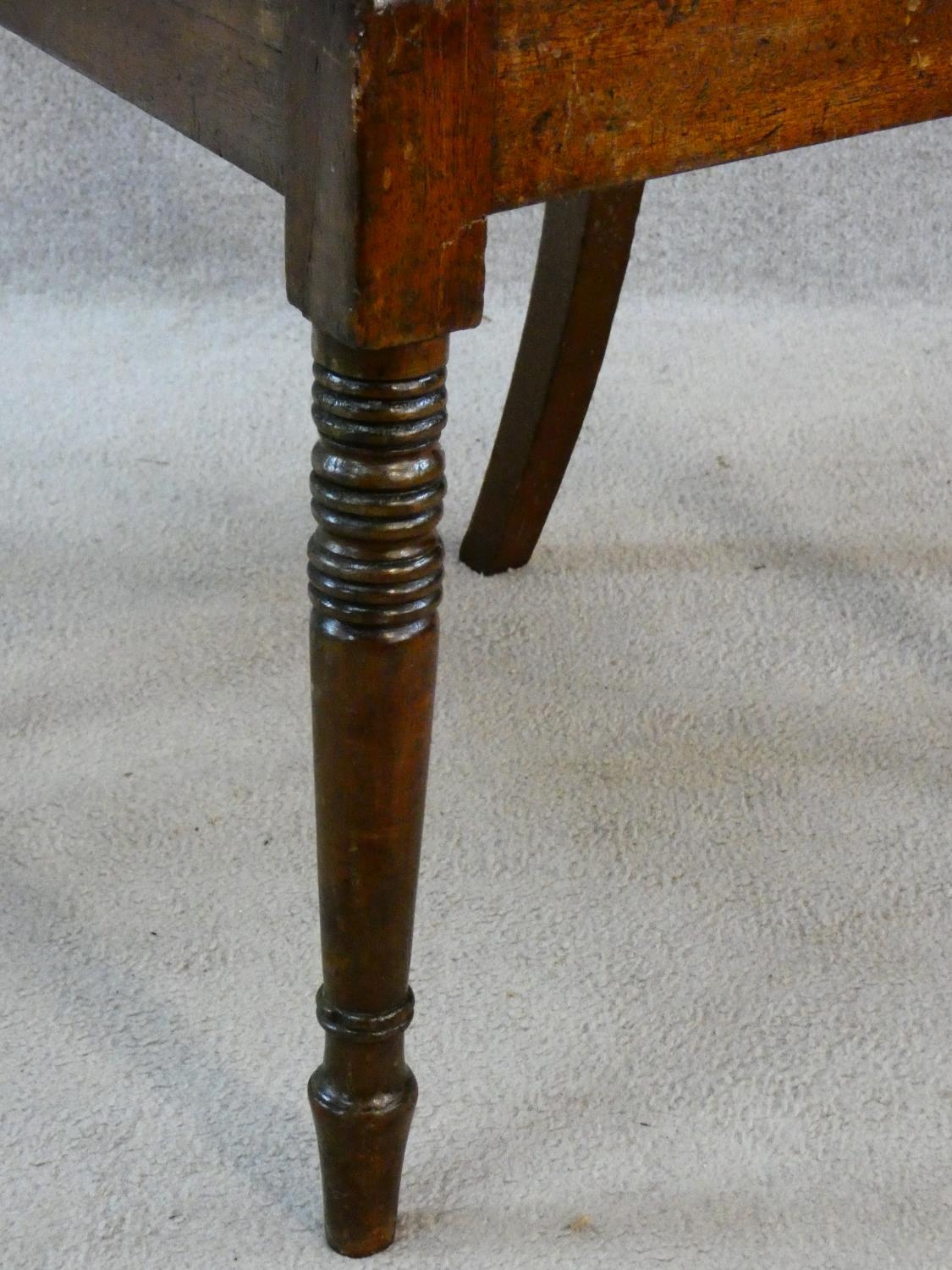 A pair of late Georgian mahogany dining chairs with carved bar backs and splats above drop in - Image 7 of 8