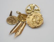 A collection of gold jewellery. Including a gold plated repousse brooch of Jehanne by Edmond-Henri