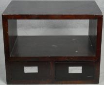 A contemporary side cabinet fitted with base drawers. H.50 W.64 D.42cm