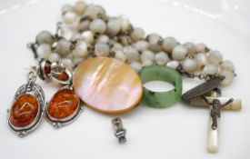 A Victorian silver and mother of pearl carved rosary, a pair of Baltic amber and silver stud