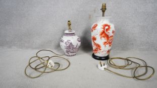 A Chinese style baluster table lamp with dragon decoration and character marks to the back and a