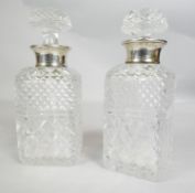 Two silver collared cut crystal decanters (one with original stopper). Hallmarked R&D for