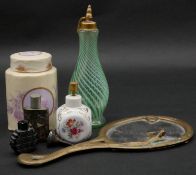 A collection of dressing table items. Including a vaseline swirl glass atomiser, an Art Nouveau