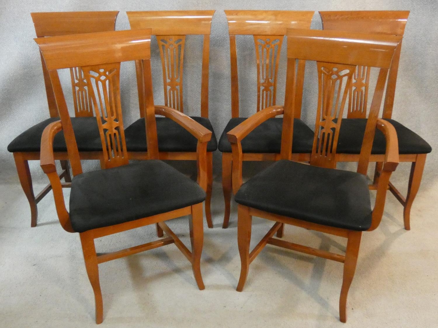 A set of six contemporary Italian cherrywood dining chairs by Pietro Constantini to include two