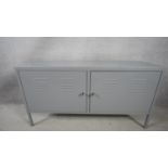 A retro industrial style metal two door side cabinet. H.63 W.18 D.40cm