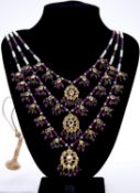 A three strand Indian ruby, emerald and pearl bridal necklace with gilded metal mirrored mosaic
