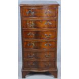 A Georgian style mahogany serpentine fronted chest of six drawers on bracket feet. H.99 W.49 D.40cm