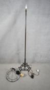 A Brutalist style wrought metal standard lamp on platform base. (With frame for shade). H.160 W.50