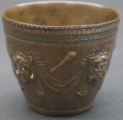A 19th century bronze classical design cup signed F. Levillain & F. Barbedienne. Decorated with