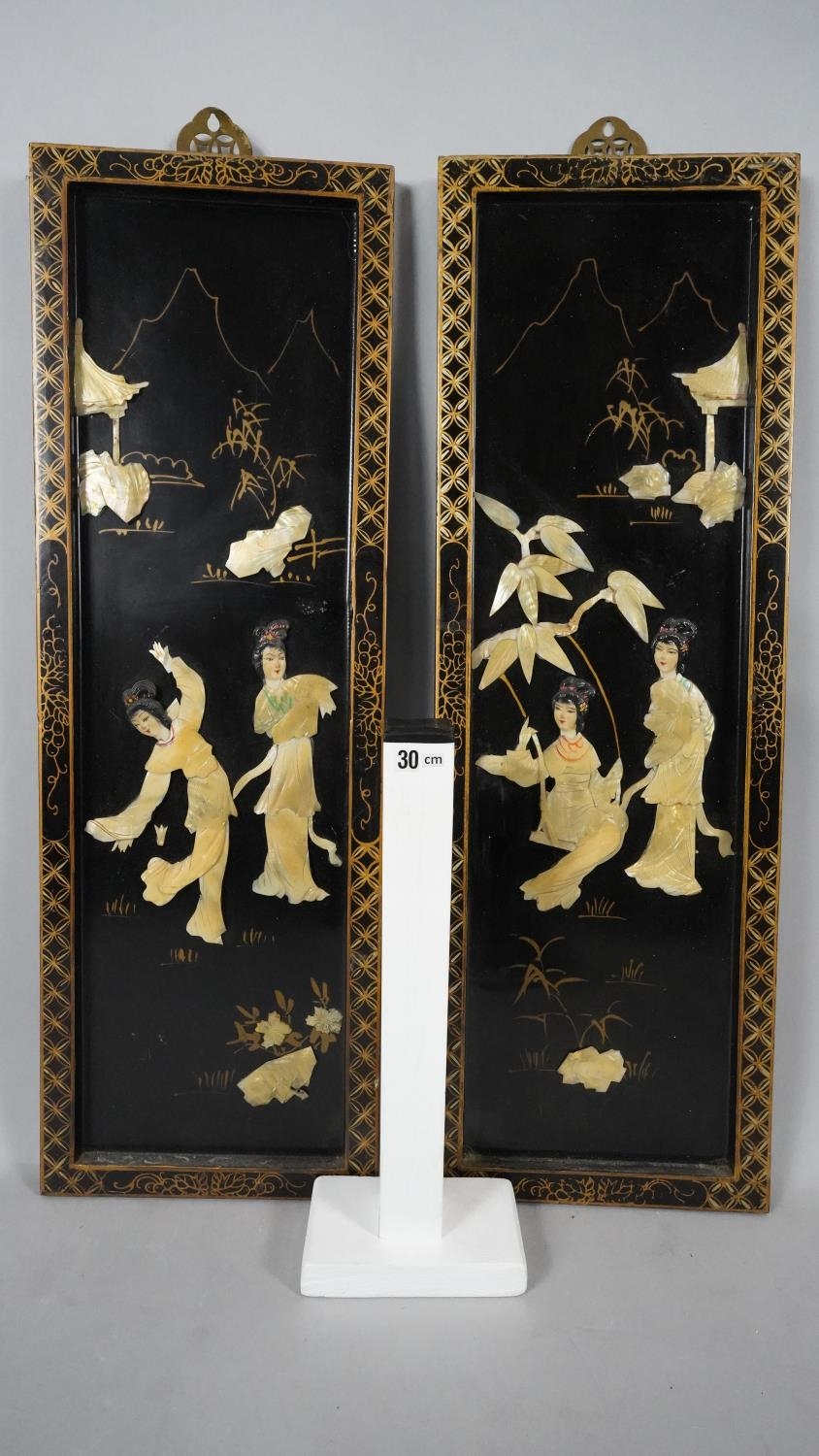 Two vintage Japanese lacquered wooden plaques with gilded borders, mounted with bone and mother of - Image 8 of 8