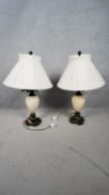 A pair of table lamps in the form of pineapples on stepped metal bases. H.79 W.51