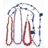 A collection of four gemstone necklaces. Including A graduated antique Carnelian bead necklace, a