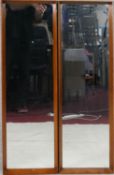 A pair of mid century vintage teak dressing mirrors. H.100 W.31cm