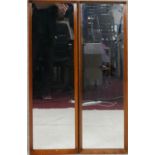 A pair of mid century vintage teak dressing mirrors. H.100 W.31cm