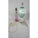 Two vintage lamps. One Val St. Lambert pink Art Glass table lamp, signed to base and a green ceramic