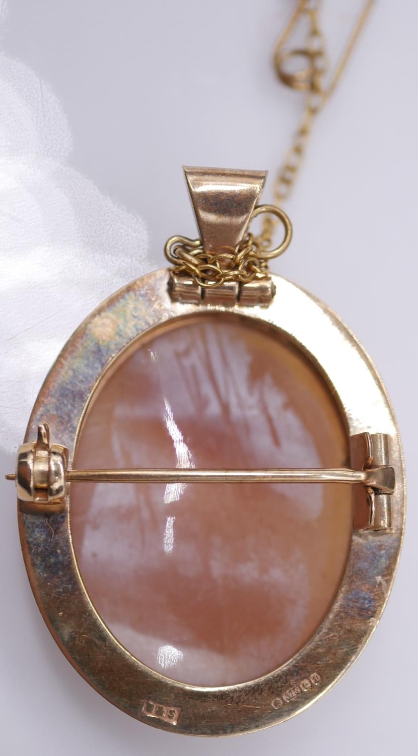 A 1970's 9 carat yellow gold and shell cameo pendant/brooch. A carved shell cameo depicting a side - Image 3 of 7