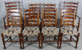 A set of eight oak Lancashire ladderback dining chairs in floral upholstery on turned stretchered