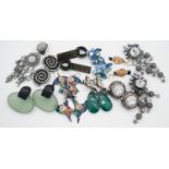 A collection of nine pairs of costume and statement earrings. Including two pairs of crystal set