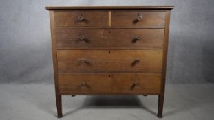 A C.1900 Arts and Crafts oak chest of drawers on square supports. H.84 W.92 D.45