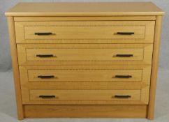 A bespoke inlaid light oak chest of drawers. H.96 W.122 D.48cm