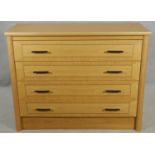 A bespoke inlaid light oak chest of drawers. H.96 W.122 D.48cm