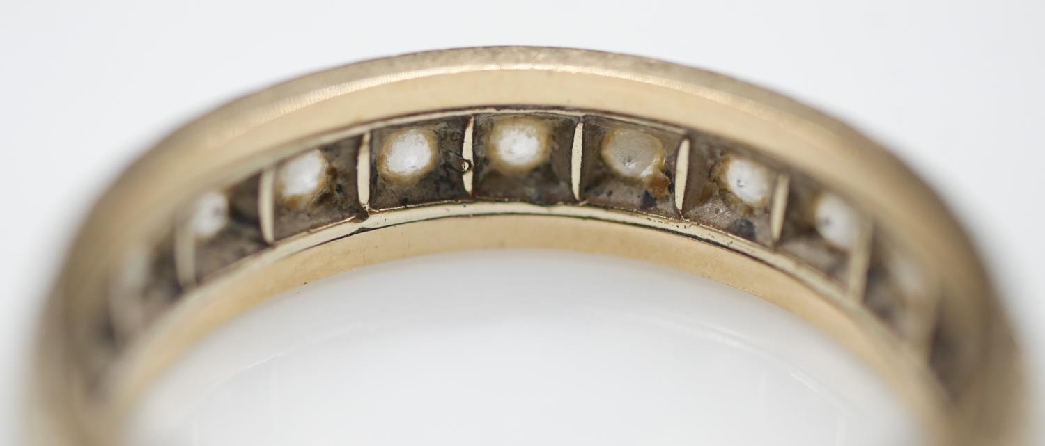 A yellow metal paste set (tested as gold) full eternity ring set with twenty two round old cut white - Image 4 of 4