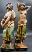 A pair of mid century Art Deco style ceramic figures, Moorish Dancers. Signed and numbered. H.48 W.